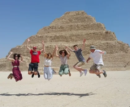 Tourists exploring the Great Pyramids of Giza, Dahshur pyramids, and Saqqara step pyramid, discovering the wonders of ancient Egypt monuments.