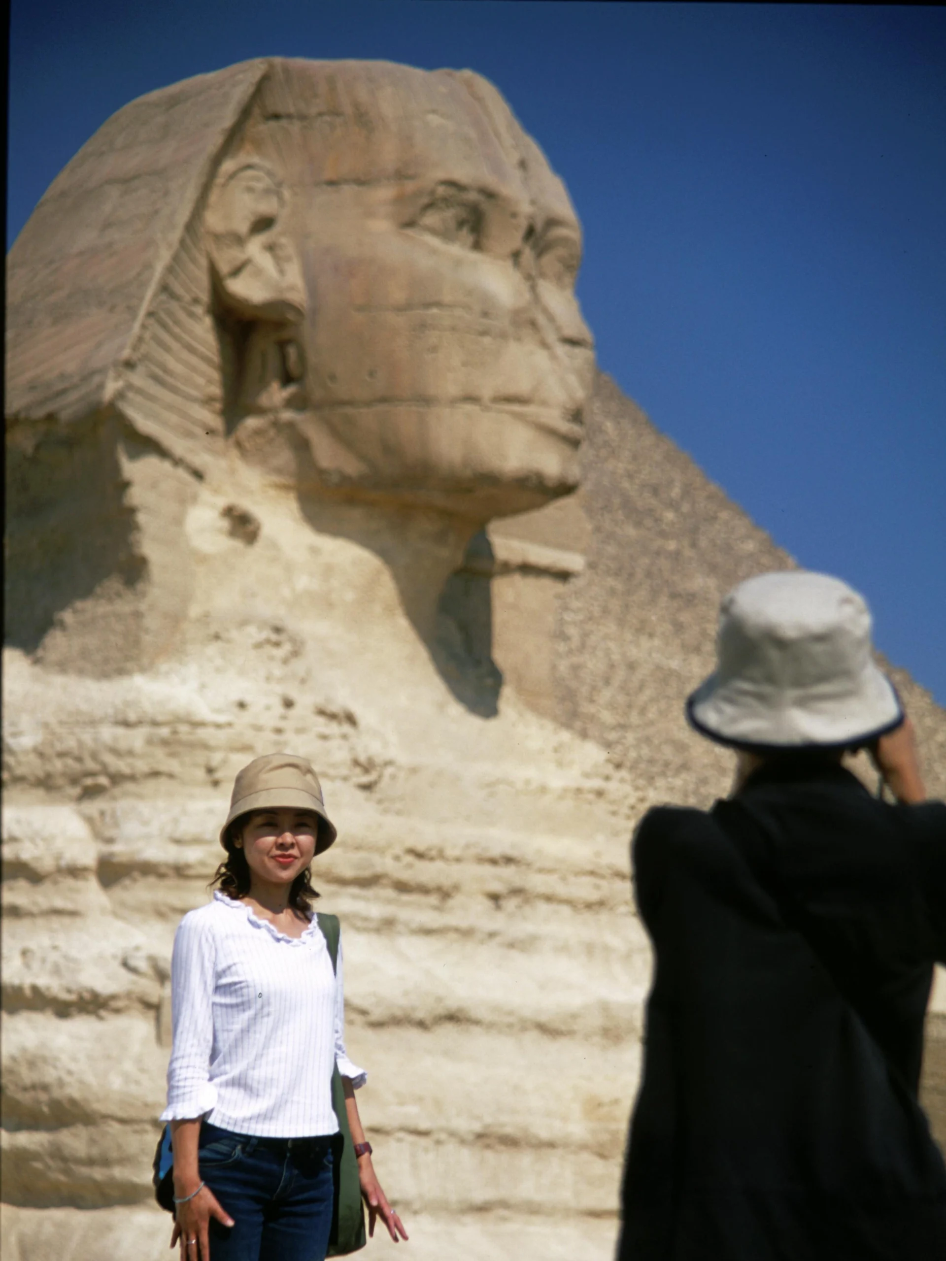 "Marvel at the iconic Giza Pyramids, the enigmatic Sphinx, and the ancient Step Pyramid of Sakkara in Egypt."