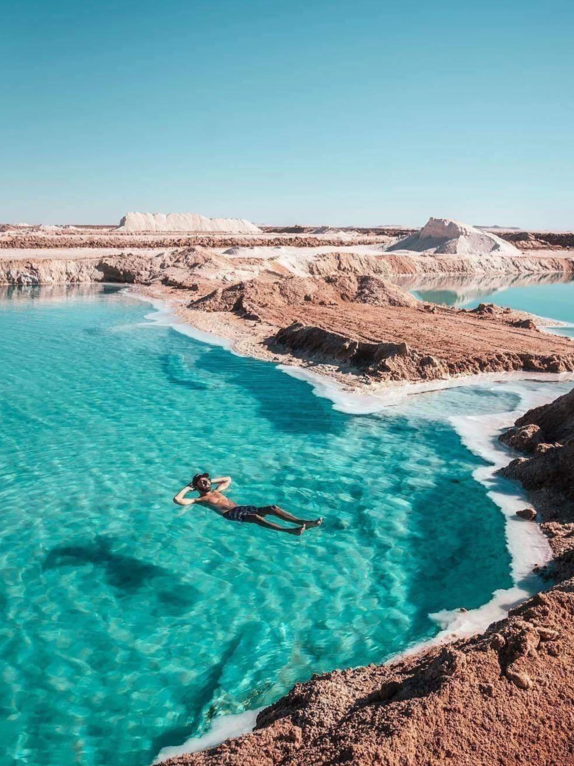 "Explore the tranquil landscapes, palm groves, and salt lakes of Siwa Oasis on a trip from Cairo."