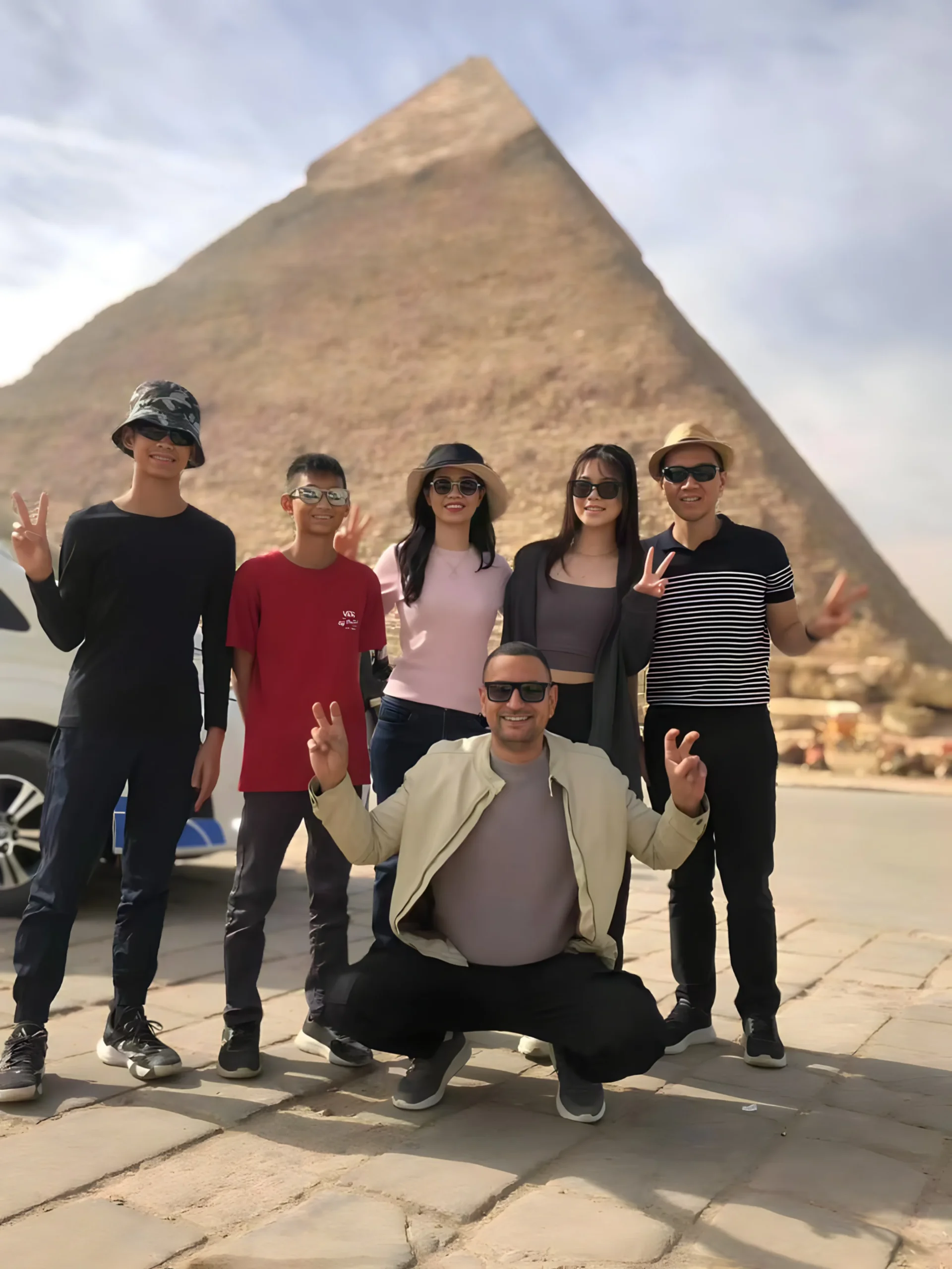 Group of tourists exploring the Temple of Philae in Aswan